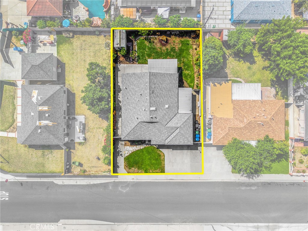 14721 Riata Street Midway City, CA 92655 - Photo 34 of 37 front view of a house with a street