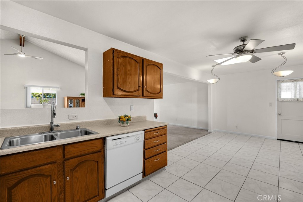 14721 Riata Street Midway City, CA 92655 - Photo 8 of 37 a spacious bathroom with a double vanity sink mirror and