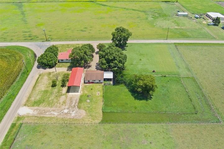 358 Wright Road Waxahachie, TX 75167 - Photo 2 of 38 a view of an outdoor space and a lake view