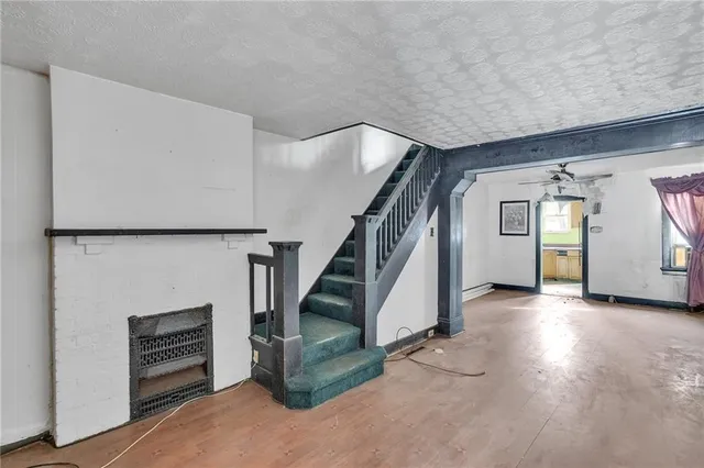 a view of livingroom with kitchen