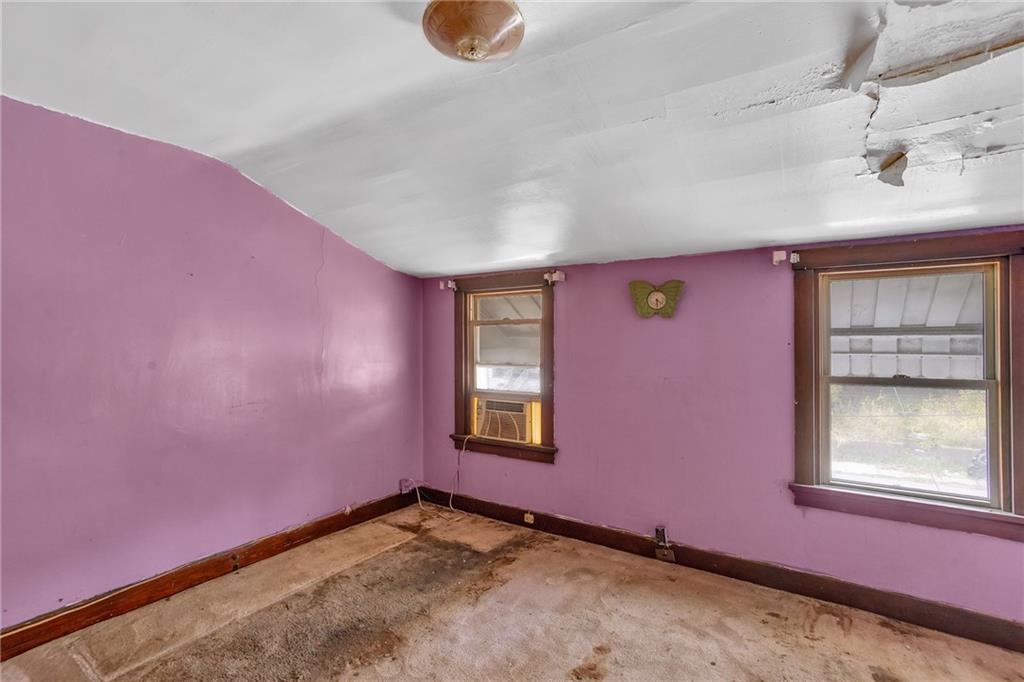 1616 Montier Street Pittsburgh, PA 15221 - Photo 17 of 22 an empty room with windows