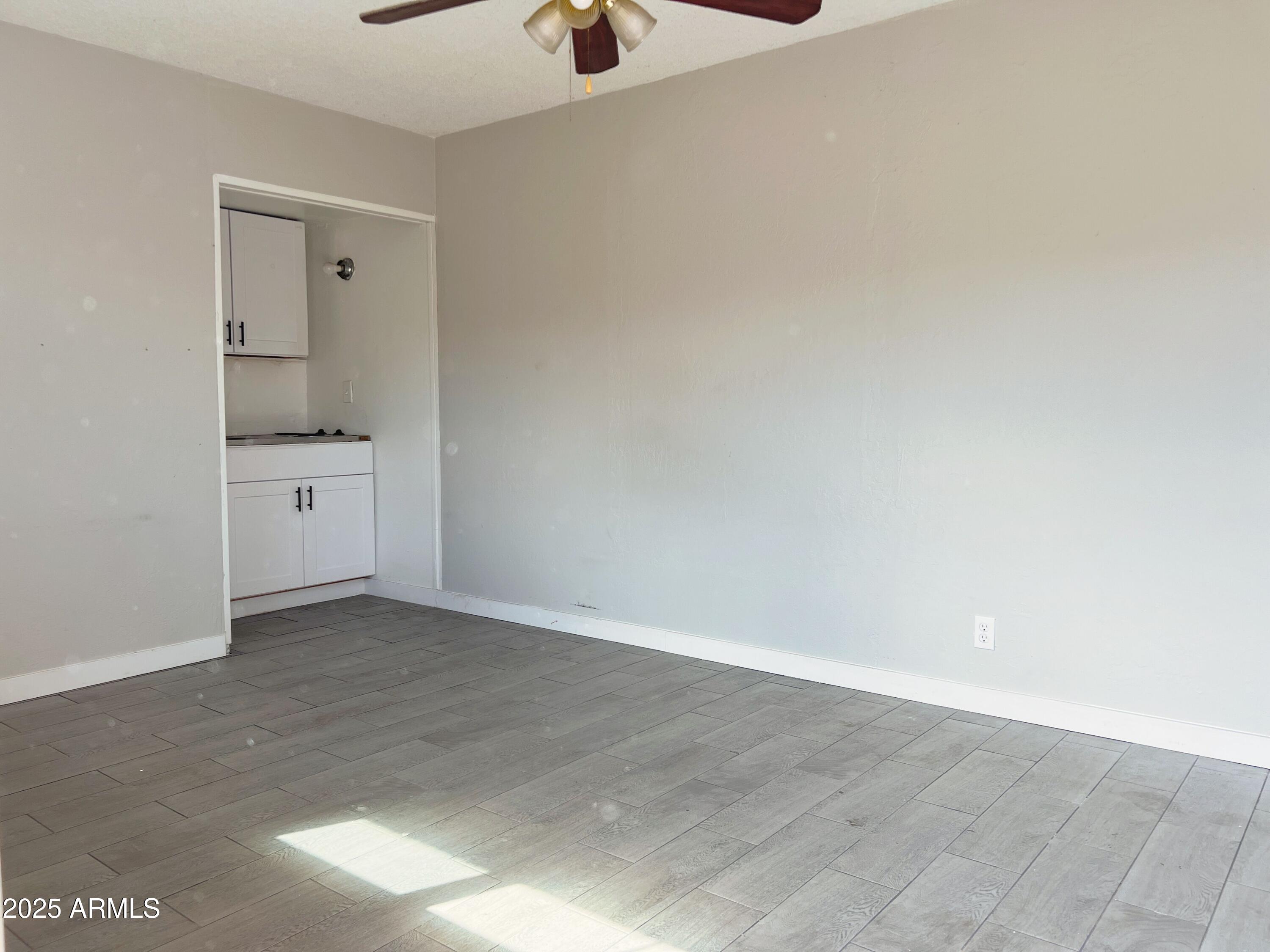 6413 East Avalon Street, Unit E Mesa, AZ 85205 - Photo 2 of 6 wooden floor in a room
