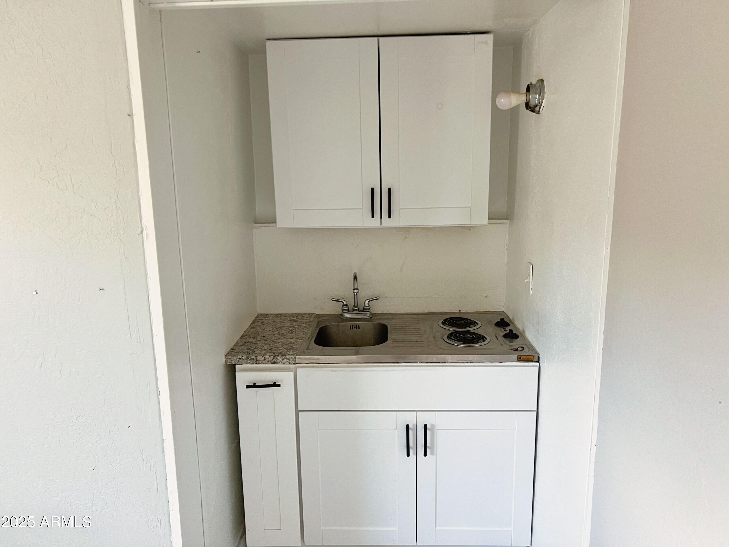 6413 East Avalon Street, Unit E Mesa, AZ 85205 - Photo 3 of 6 a utility room with dryer and washer