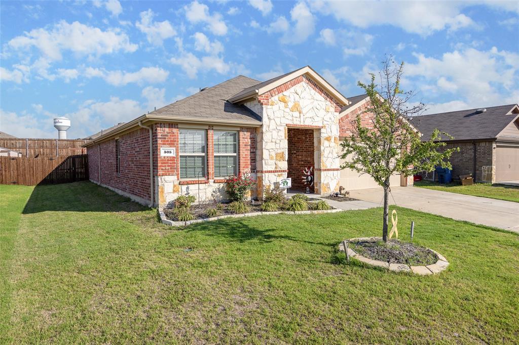 505 Saw Mill Road Royse City, TX 75189 - Photo 1 of 1 a front view of a house with garden