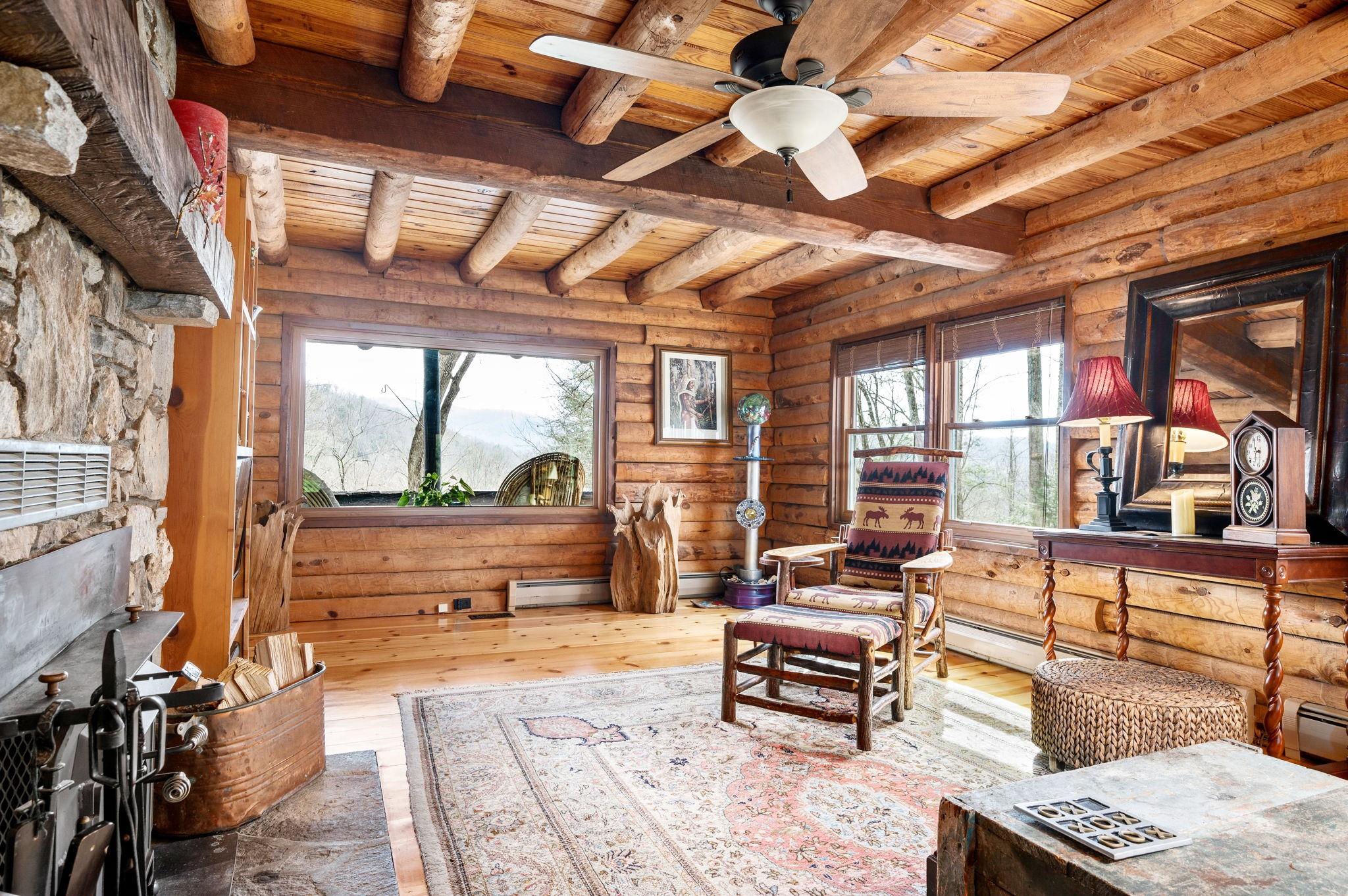 25 Dycus Drive Fairview, NC 28730 - Photo 14 of 30 a living room with furniture and a flat screen tv