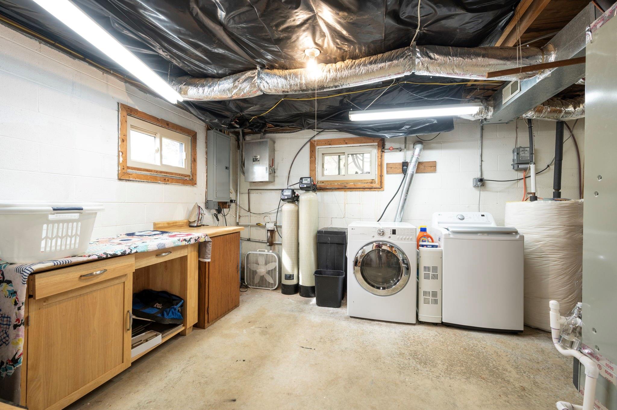 25 Dycus Drive Fairview, NC 28730 - Photo 24 of 30 a utility room with dryer and washer