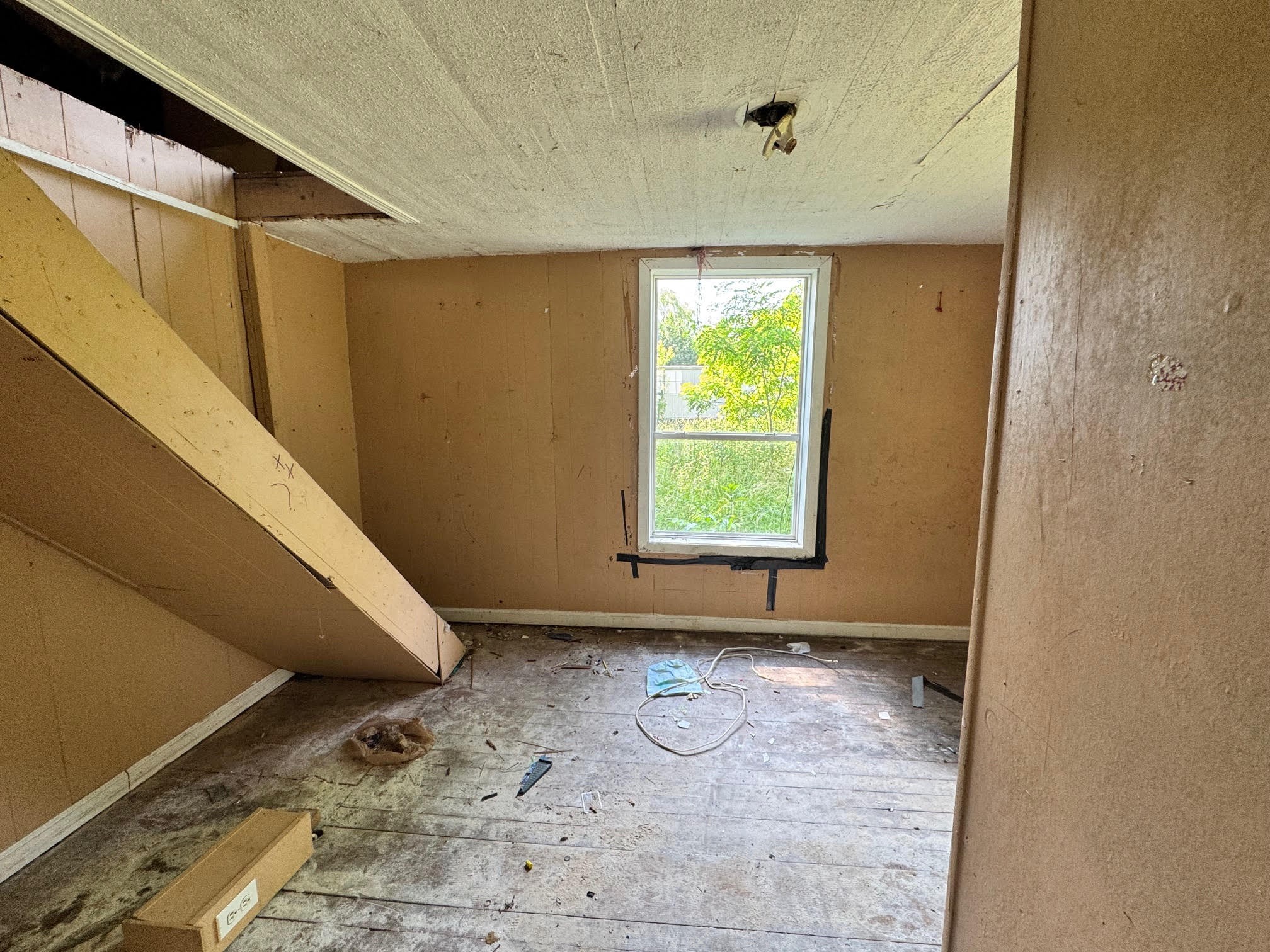 1070 West Rock Quarry Road Clarkrange, TN 38553 - Photo 7 of 12 a view of an empty room with a window