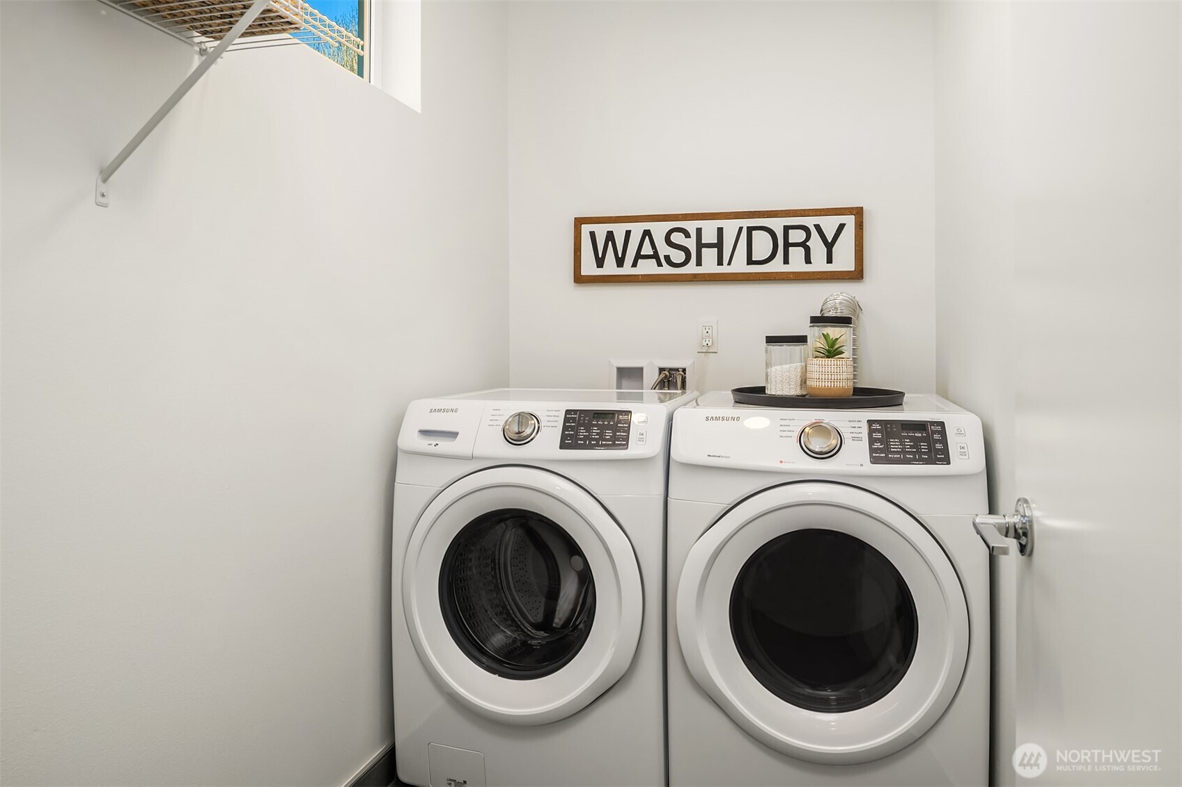 2455 Wickstrom Place Southwest Seattle, WA 98116 - Photo 18 of 36 a utility room with dryer and washer