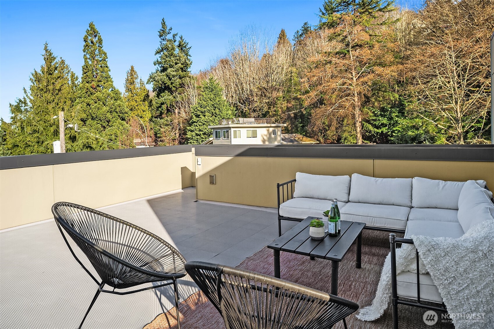2455 Wickstrom Place Southwest Seattle, WA 98116 - Photo 22 of 36 a balcony with table and chairs