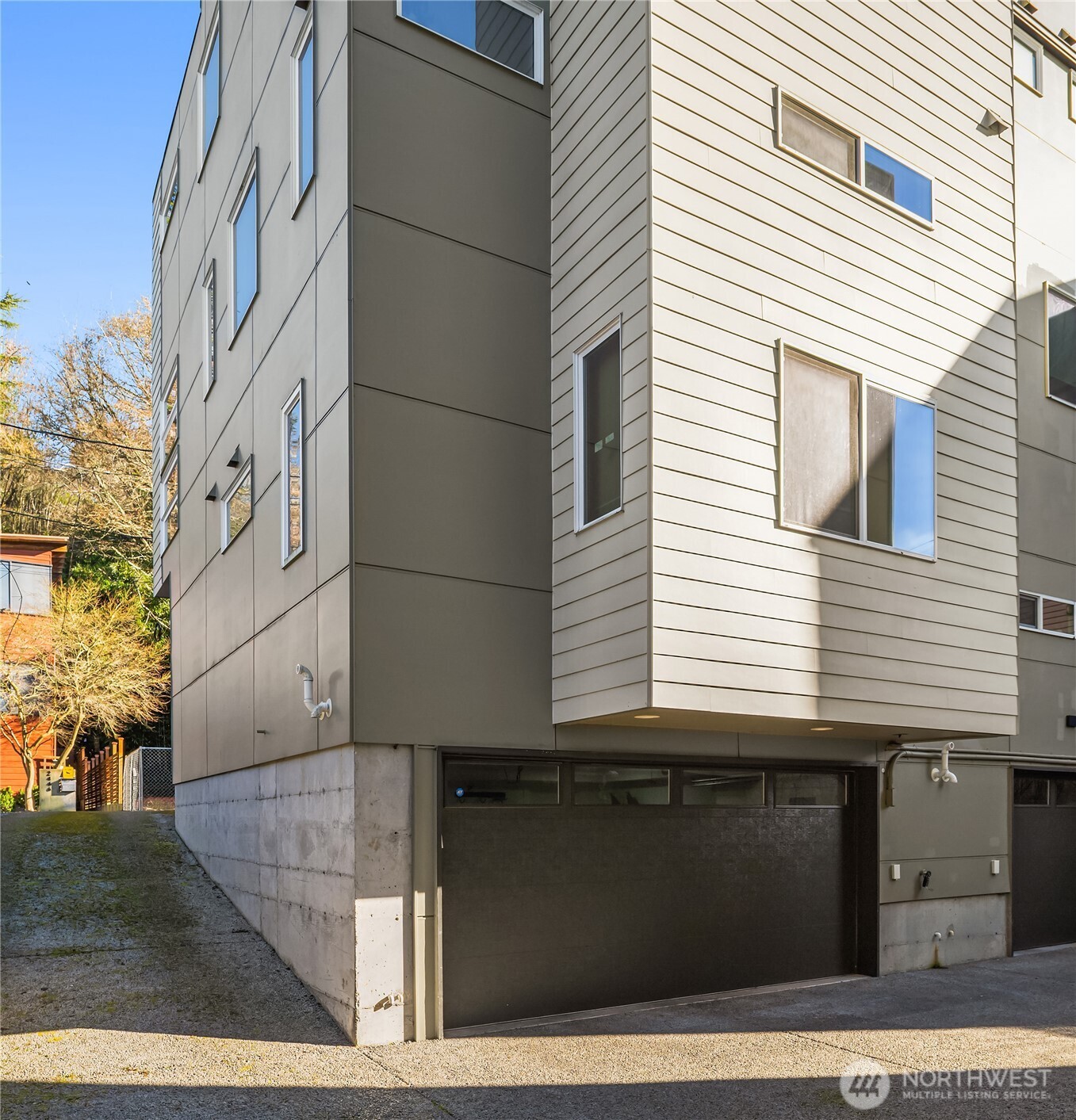 2455 Wickstrom Place Southwest Seattle, WA 98116 - Photo 35 of 36 a view of a house with a street
