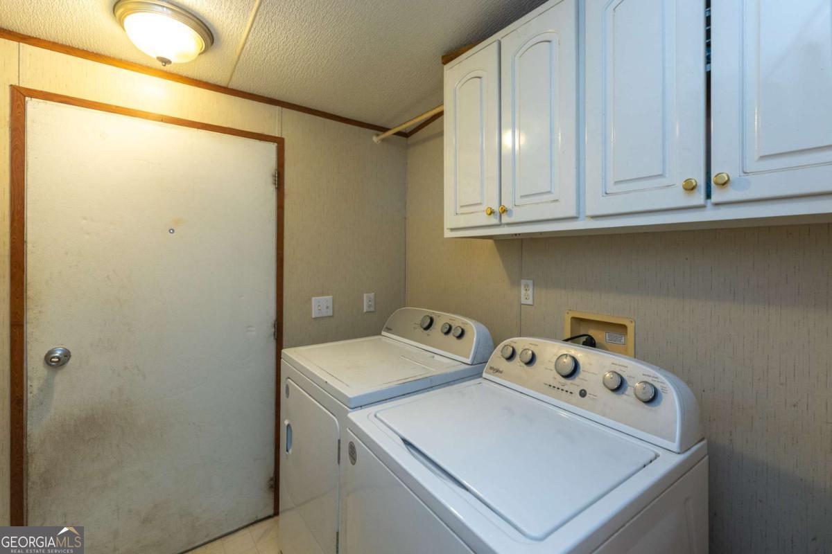 3547 Chapel Lane Blackshear, GA 31516 - Photo 14 of 33 a utility room with dryer and washer