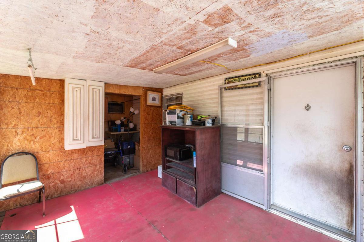 3547 Chapel Lane Blackshear, GA 31516 - Photo 25 of 33 a room with furniture and a fireplace