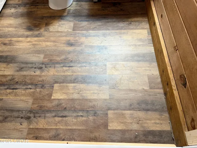 a bathroom with a toilet and a vanity