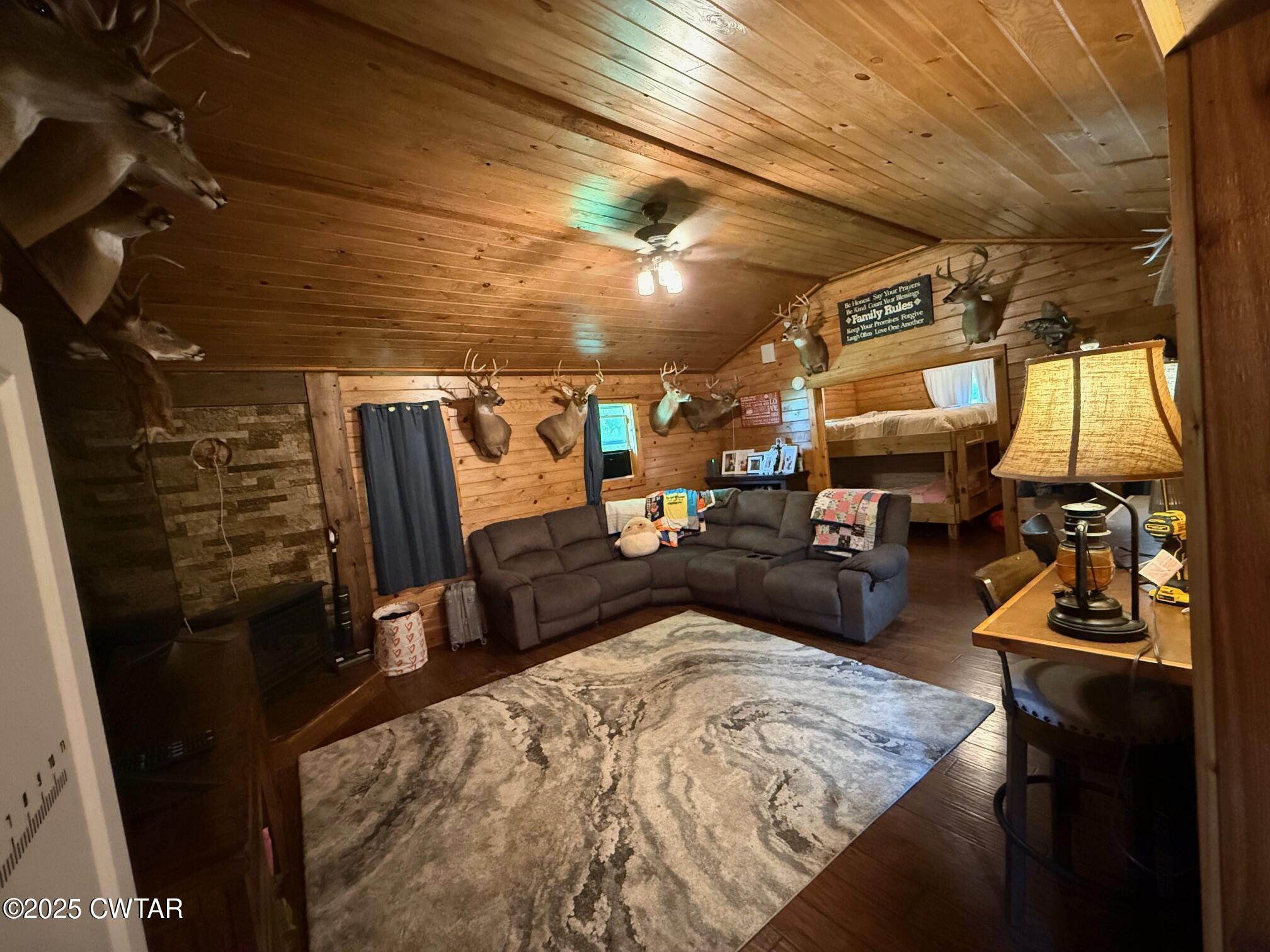 972 Cleve Duke Road Hornbeak, TN 38232 - Photo 14 of 36 a view of a room with gym equipment