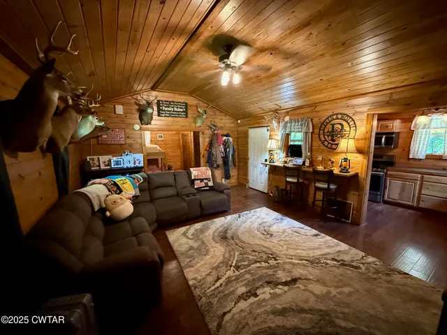 a very nice looking kitchen with a large window