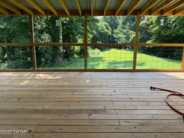 a view of a backyard with a garden