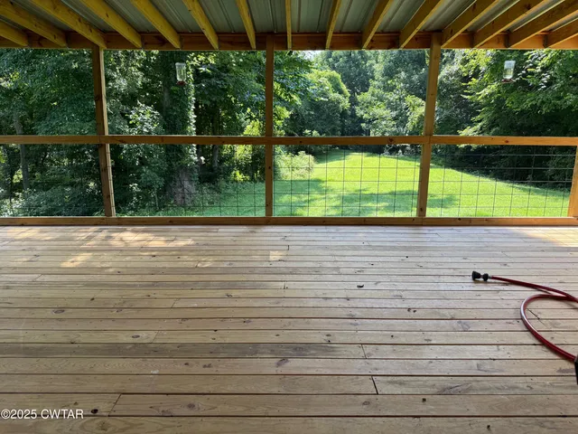 a view of a backyard with a garden