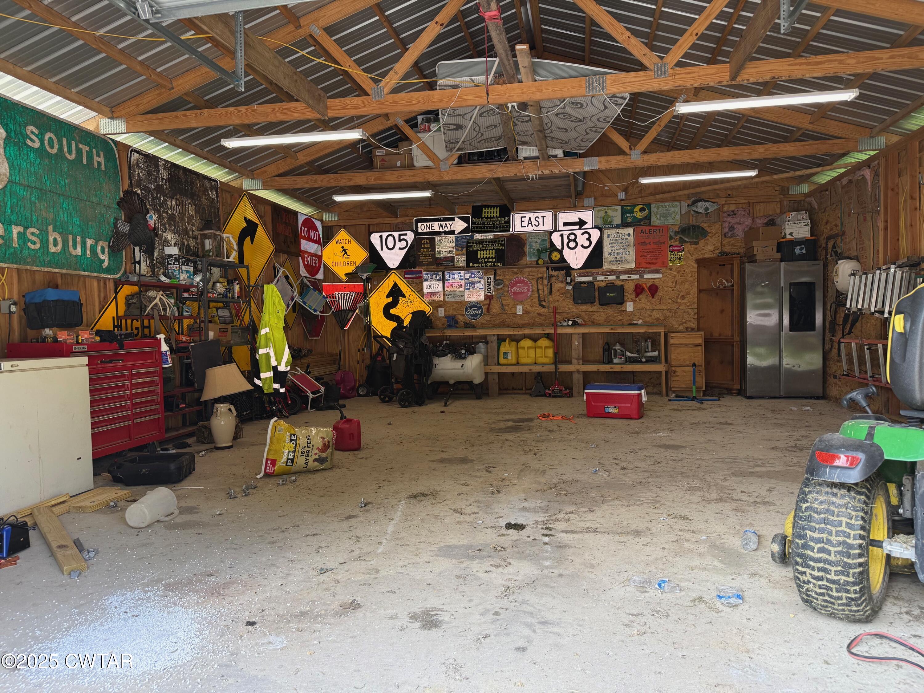 972 Cleve Duke Road Hornbeak, TN 38232 - Photo 33 of 36 a view of storage and utility room