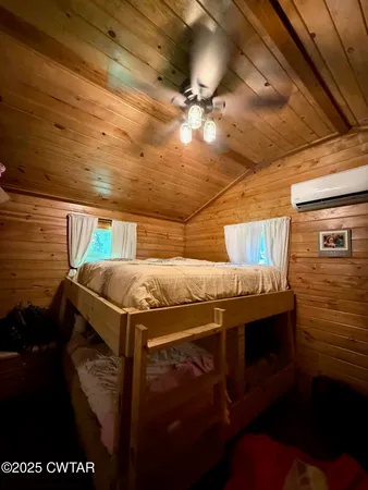 a bedroom with bunk bed