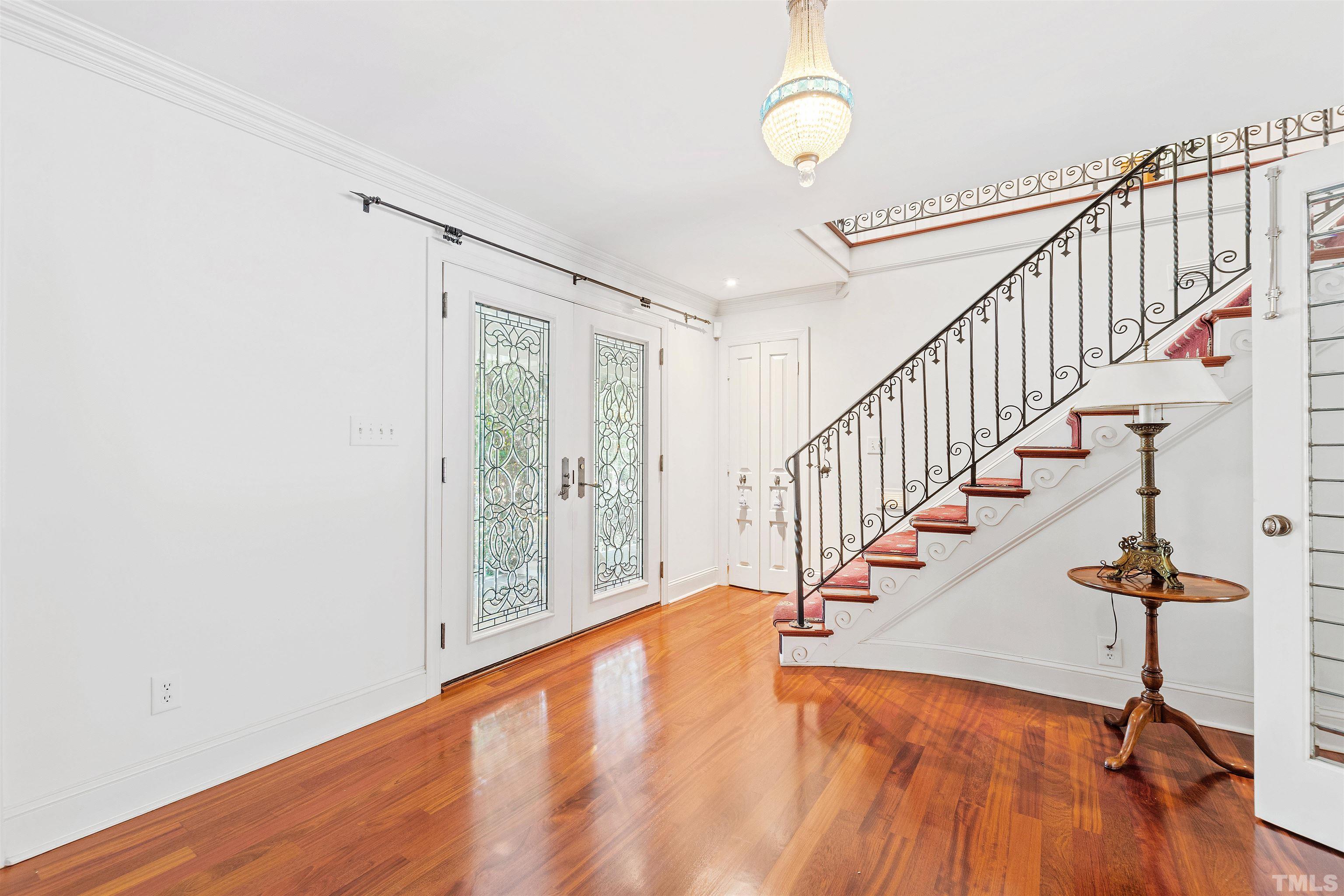 2429 Kirks Ridge Drive Raleigh, NC 27606 - Photo 21 of 65 a view of entryway with wooden floor