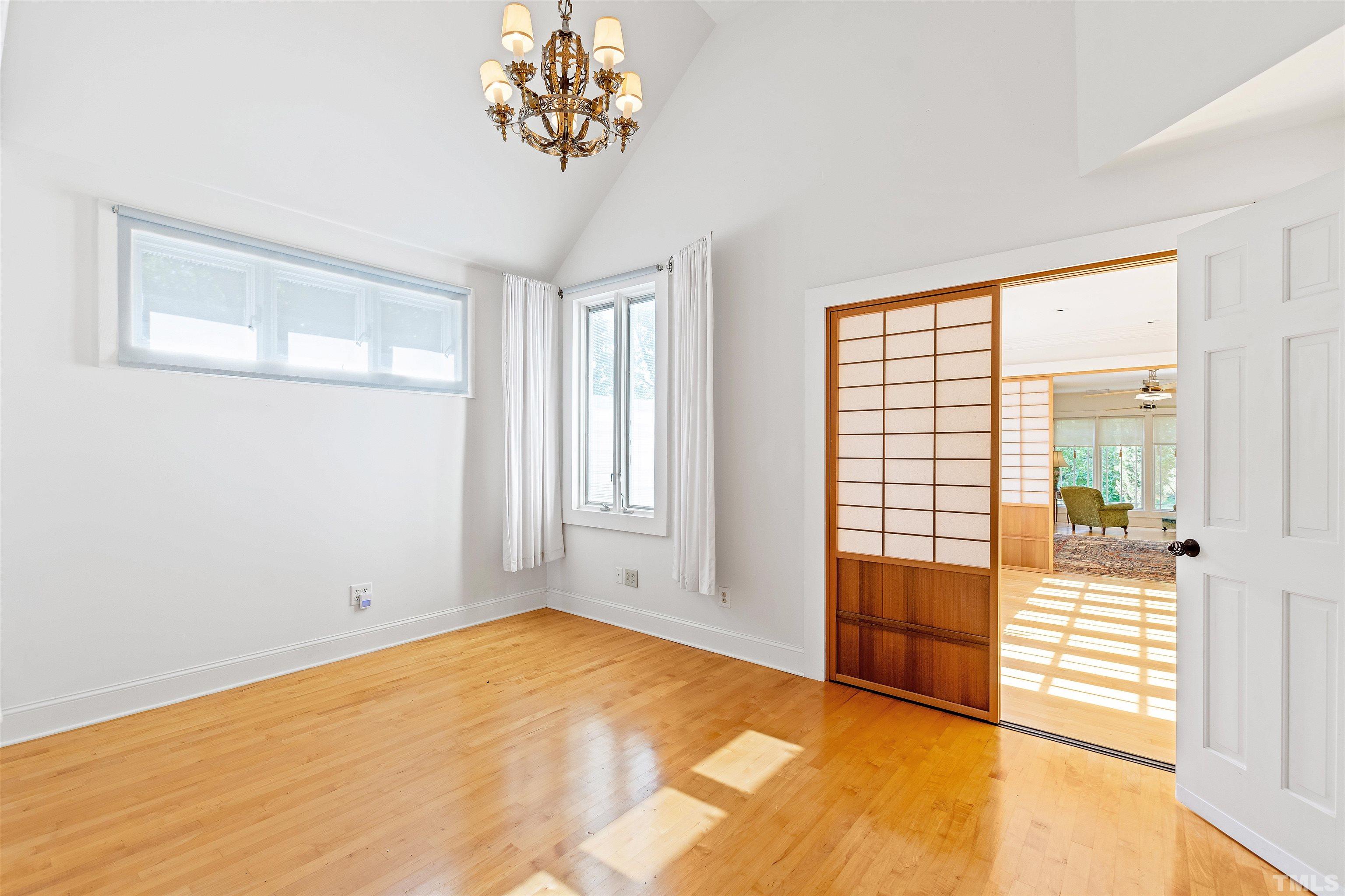 2429 Kirks Ridge Drive Raleigh, NC 27606 - Photo 55 of 65 a view of an empty room with a window