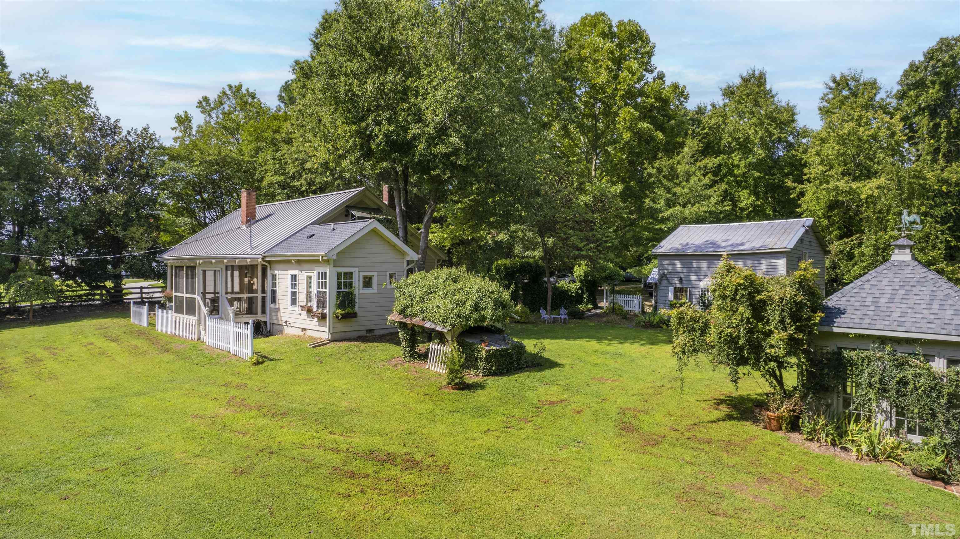 2429 Kirks Ridge Drive Raleigh, NC 27606 - Photo 65 of 65 a view of a house with pool table and chairs