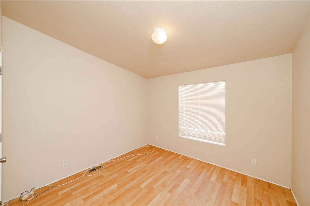 4729 Stewart Mountain Road Golden Valley, AZ 86413 - Photo 16 of 28 a view of an empty room and window