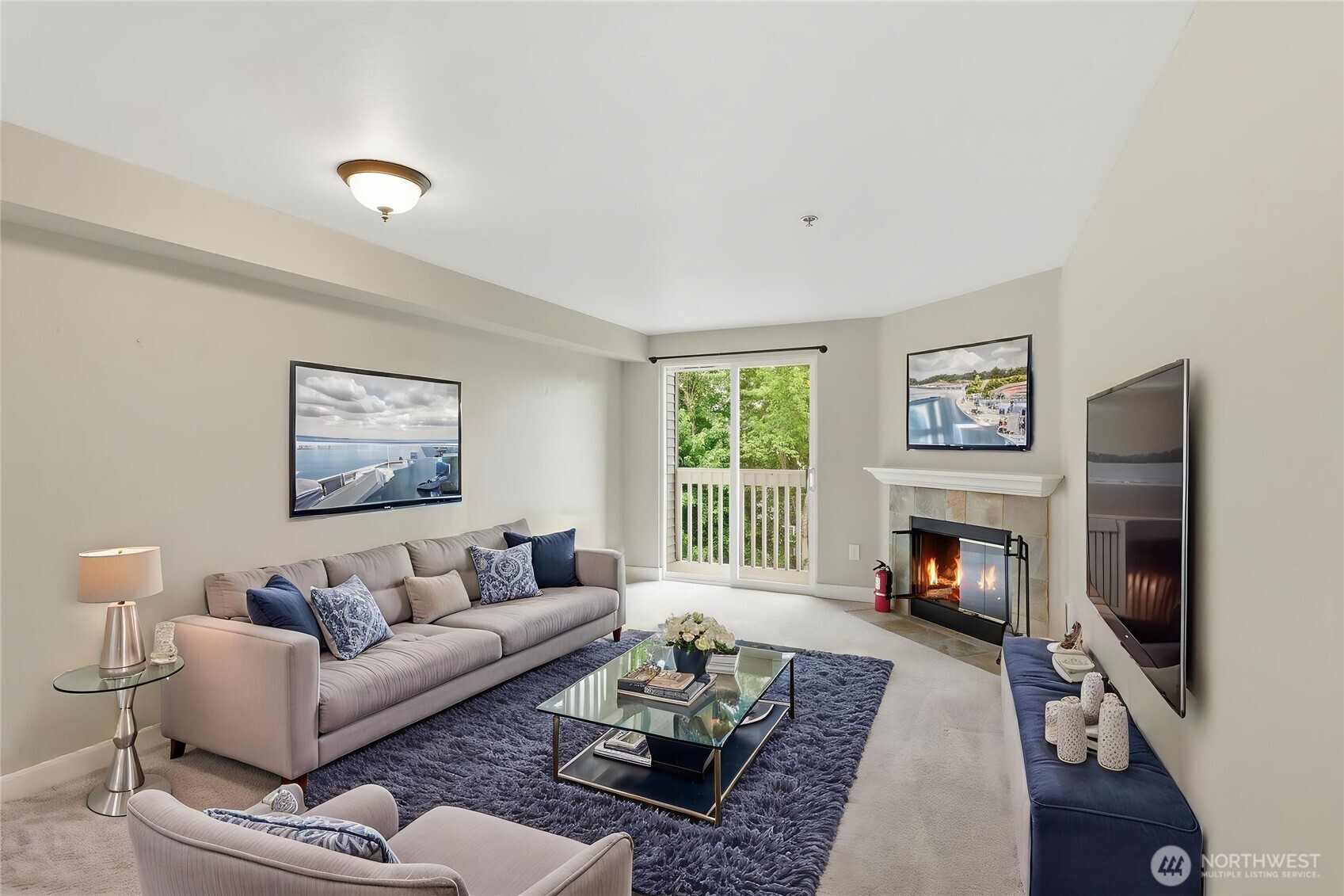 16409 Currie Road Southeast, Unit A308 Monroe, WA 98272 - Photo 6 of 21 a living room with furniture and a fireplace