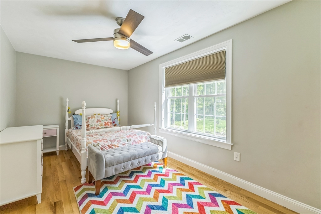 82 Sutton Street Uxbridge, MA 01569 - Photo 18 of 31 a bedroom with two beds and a lamp