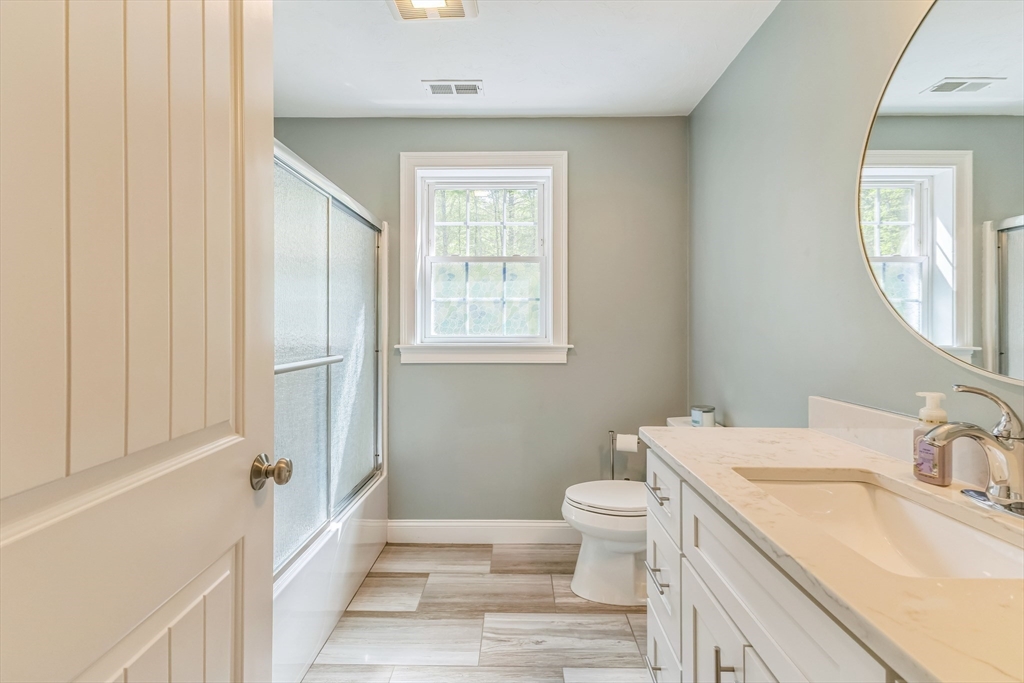 82 Sutton Street Uxbridge, MA 01569 - Photo 21 of 31 a bathroom with a sink toilet and tub