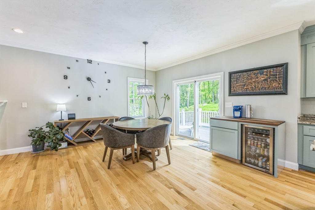 82 Sutton Street Uxbridge, MA 01569 - Photo 5 of 31 a view of a dining room with furniture window and wooden floor