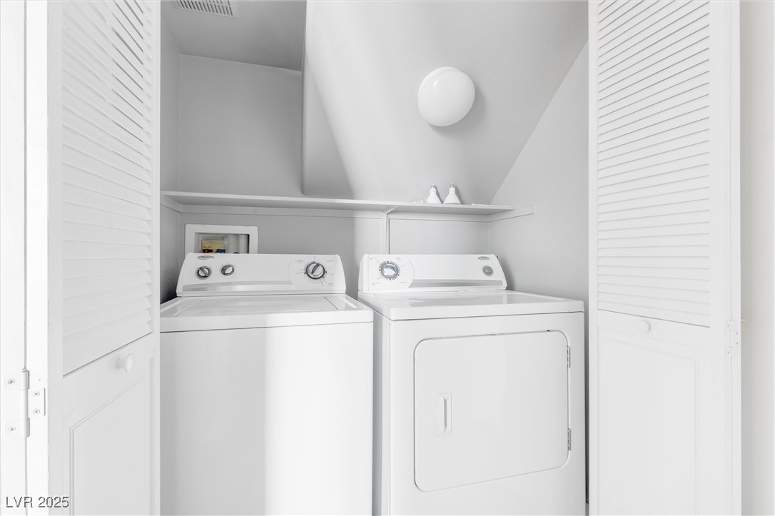 9617 Sharp Horn Court Las Vegas, NV 89149 - Photo 19 of 27 Laundry area featuring washing machine and dryer and laundry area