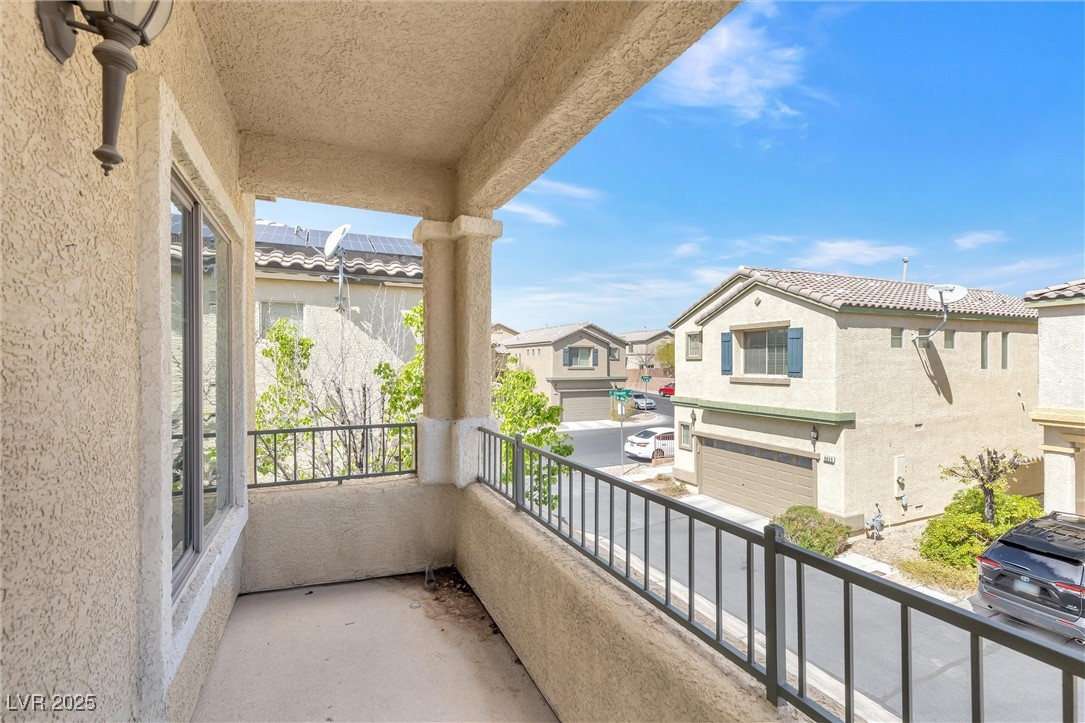 9617 Sharp Horn Court Las Vegas, NV 89149 - Photo 24 of 27 Balcony featuring a residential view