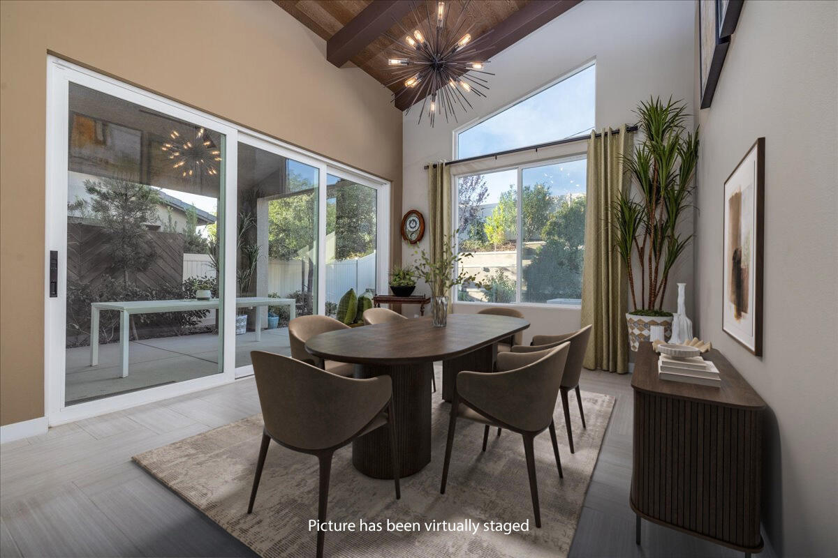 1514 Overpark Lane Beaumont, CA 92223 - Photo 13 of 76 a view of a dining room with furniture window and outside view
