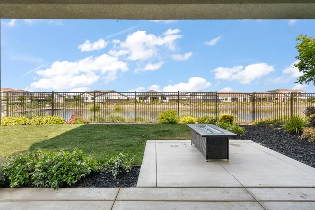 a view of a lake with a big yard