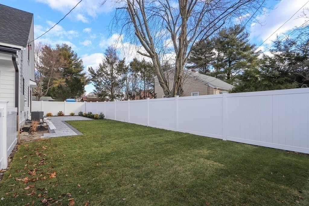 138 Lexington Street Newton, MA 02466 - Photo 27 of 27 a view of backyard with trees