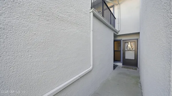 a view of hallway with stairs