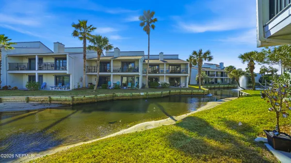 a view of a swimming pool with a lounge chairs