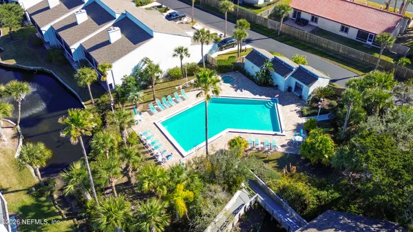 a view of a back yard of the house