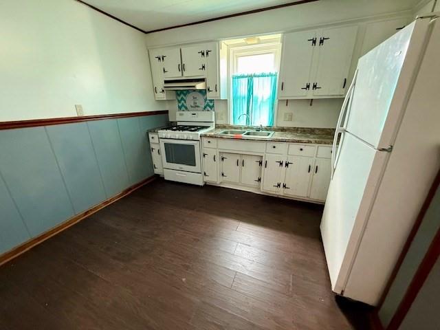 668 1/2 Addison Street Washington, PA 15301 - Photo 2 of 10 a kitchen with granite countertop a sink a stove a refrigerator and a window