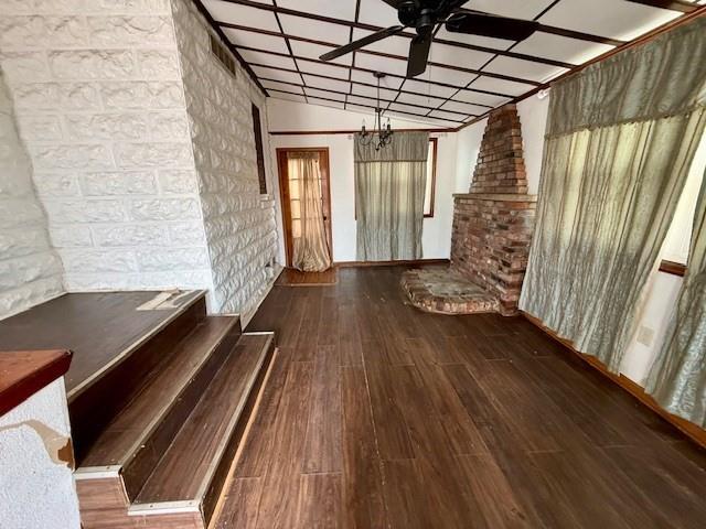 668 1/2 Addison Street Washington, PA 15301 - Photo 3 of 10 a view of an empty room with wooden floor and a window