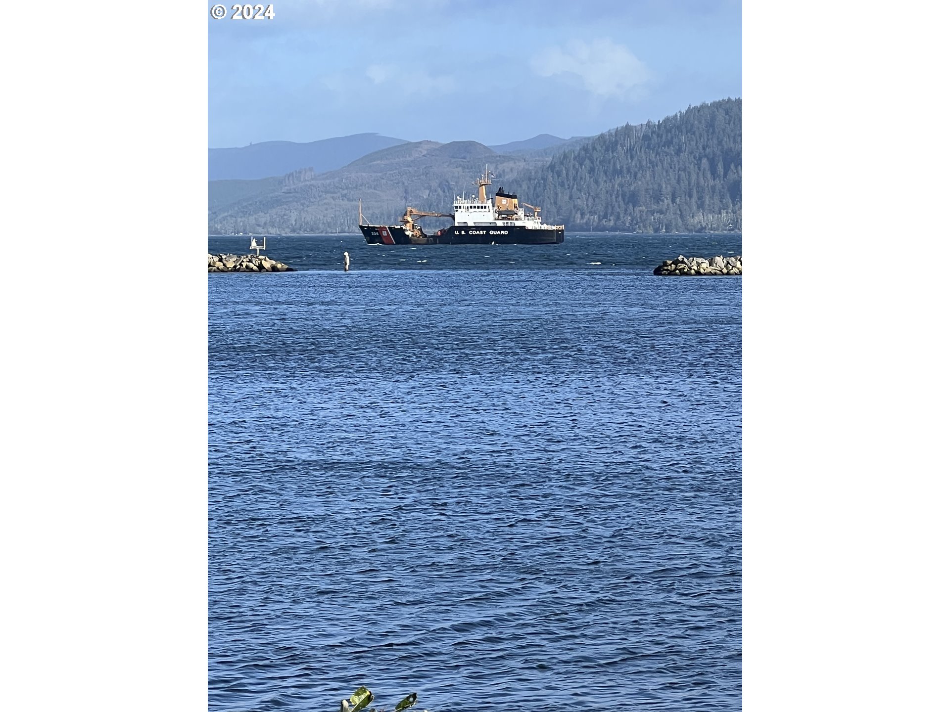 976 4th Avenue, Unit 5 Hammond, OR 97121 - Photo 13 of 13 a room with a door