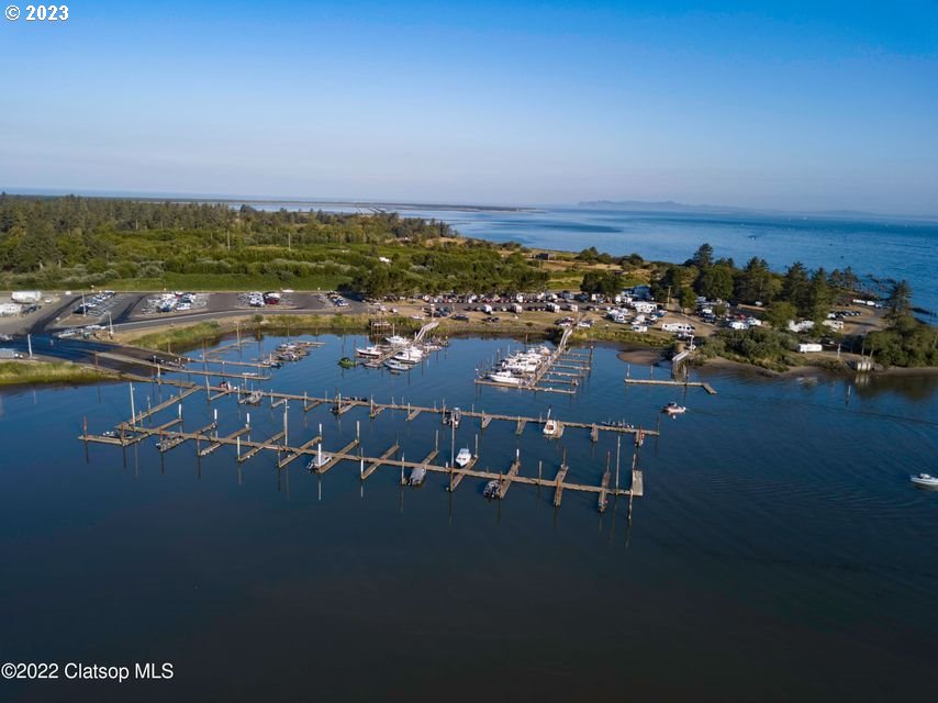 976 4th Avenue, Unit 5 Hammond, OR 97121 - Photo 2 of 13 an aerial view of a city