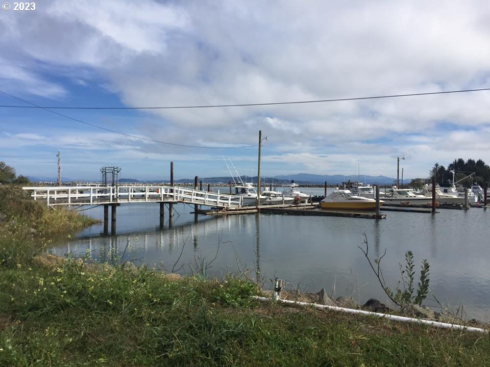 976 4th Avenue, Unit 5 Hammond, OR 97121 - Photo 10 of 13 a view of a lake