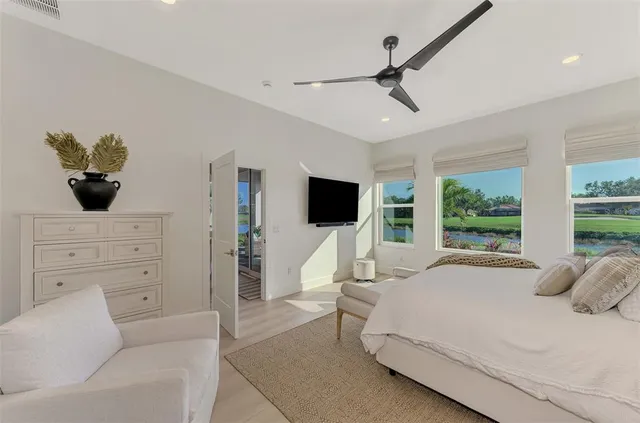 a kitchen with stainless steel appliances granite countertop a sink dishwasher and cabinets with wooden floor