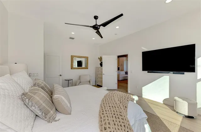 a view of a house with swimming pool and porch with furniture