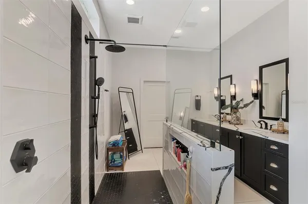 a view of a lake with houses in the back