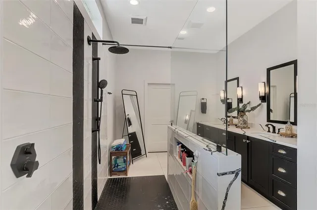 a view of swimming pool with outdoor seating and plants