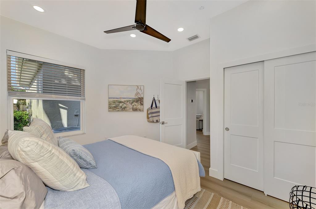 561 Fallbrook Drive Venice, FL 34292 - Photo 36 of 81 a bedroom with a large bed and a window