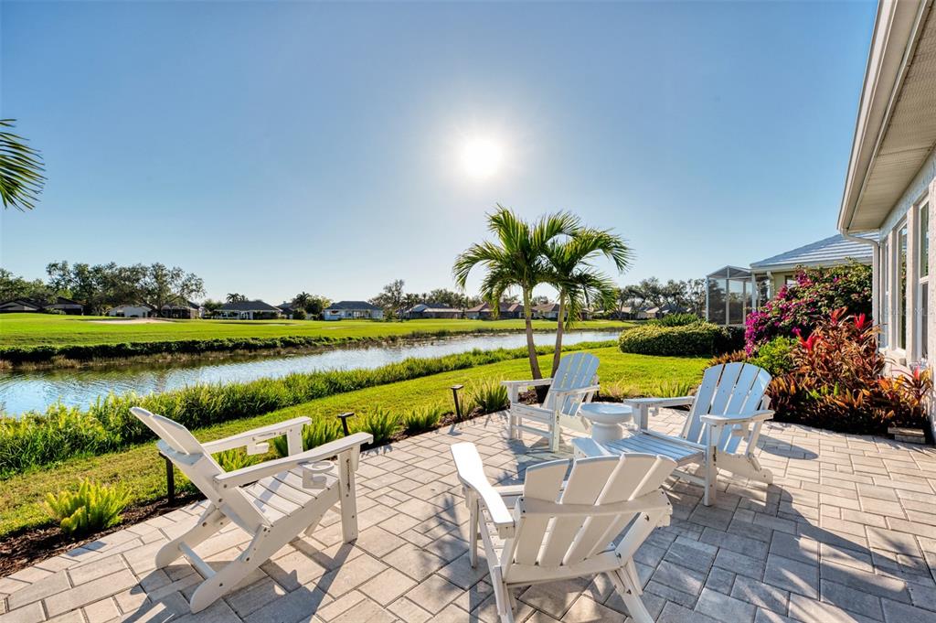 561 Fallbrook Drive Venice, FL 34292 - Photo 45 of 81 a view of swimming pool with outdoor seating and plants